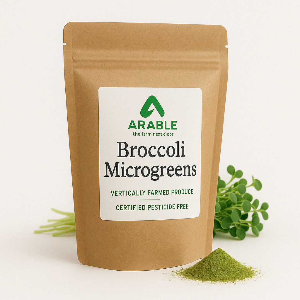 Arable Broccoli Microgreens powder pouch with fresh microgreens and green powder, labeled vertically farmed and certified pesticide-free