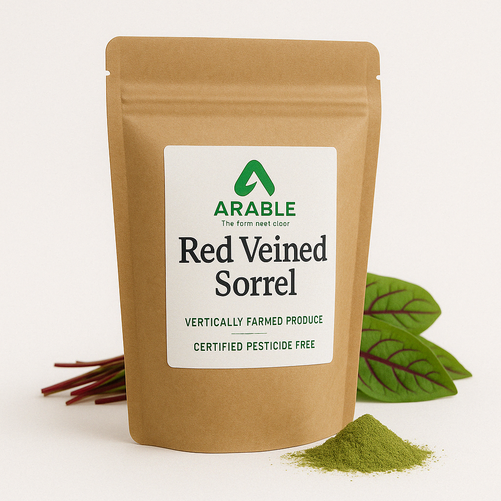 Arable Red Veined Sorrel powder pouch with fresh red-veined leaves and vibrant green powder, labeled vertically farmed and certified pesticide-free