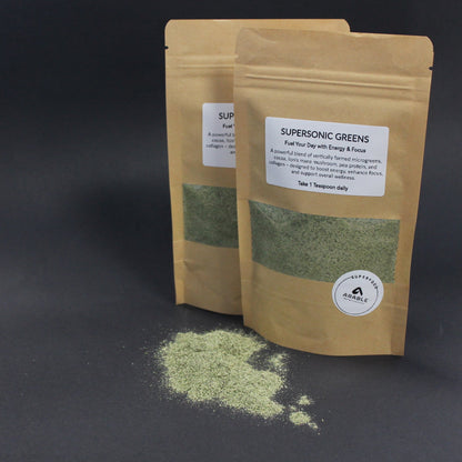 Organic microgreen powder blend in eco-friendly kraft packaging by Arable Grow, rich in antioxidants, vitamins, and chlorophyll. Superfood supplement for smoothies, shakes, and immune support.